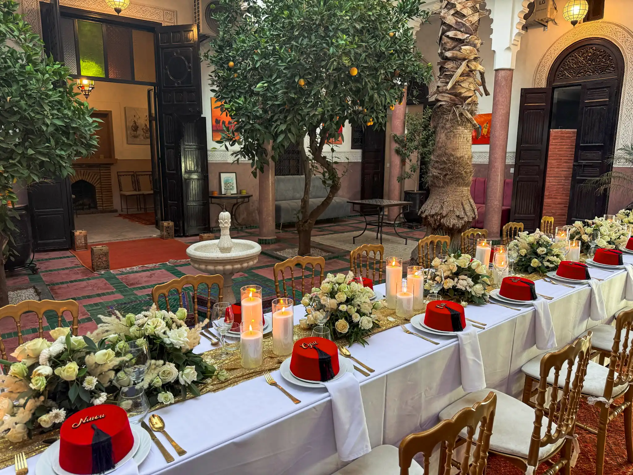 Refined event table setup in a riad in Marrakech showcasing disciplined luxury production by Rose Mirage