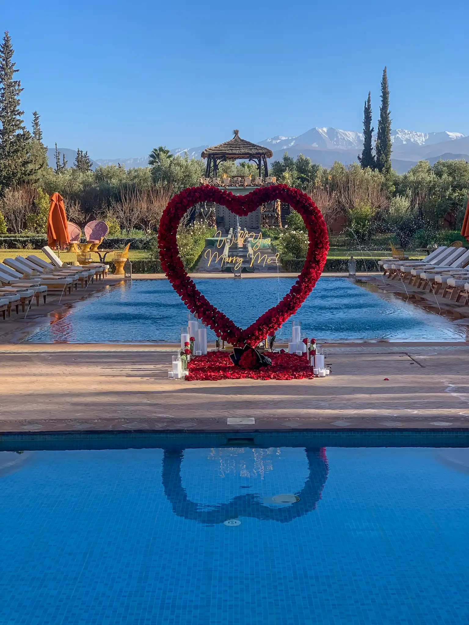 Signature romantic marriage proposal setting in a private villa with views of the Atlas Mountains in Marrakech by Rose Mirage